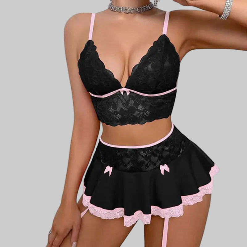 Black lace lingerie set with pink accents on a white background