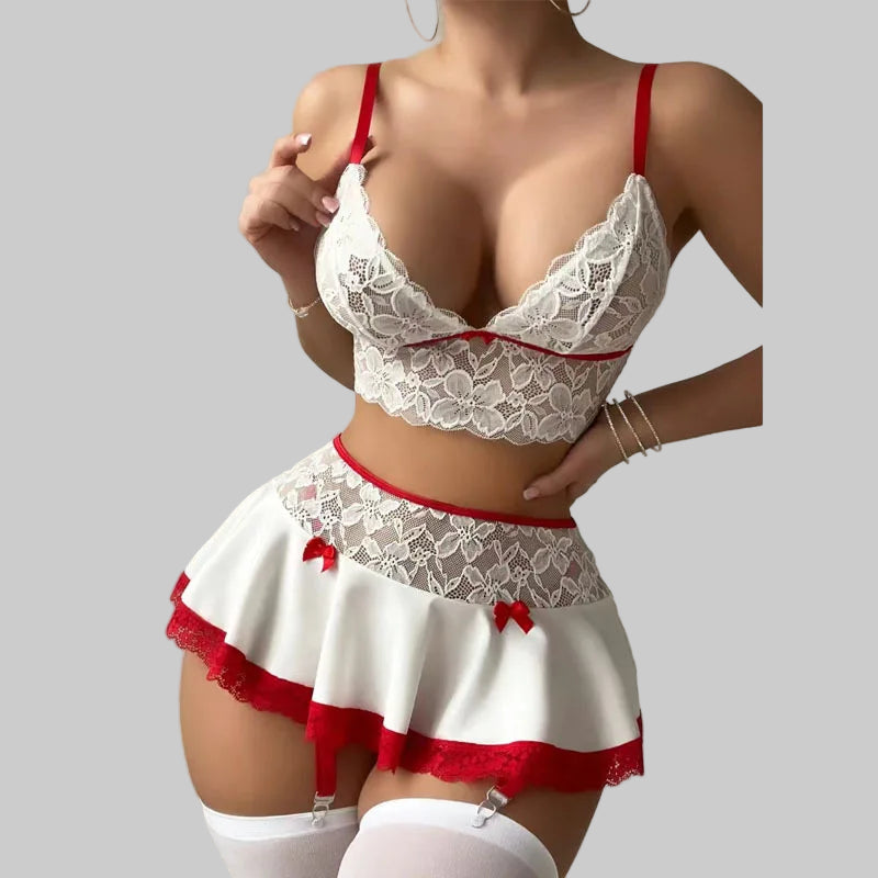 White lace lingerie set with red accents on a neutral background