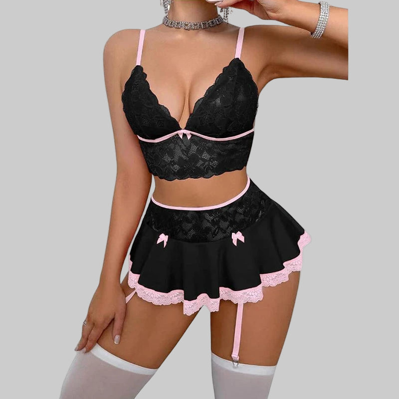 Black lace lingerie set with pink accents on a white background