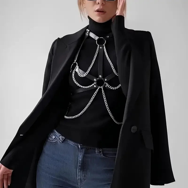 Black harness with silver chain straps and layered chain loops at the chest