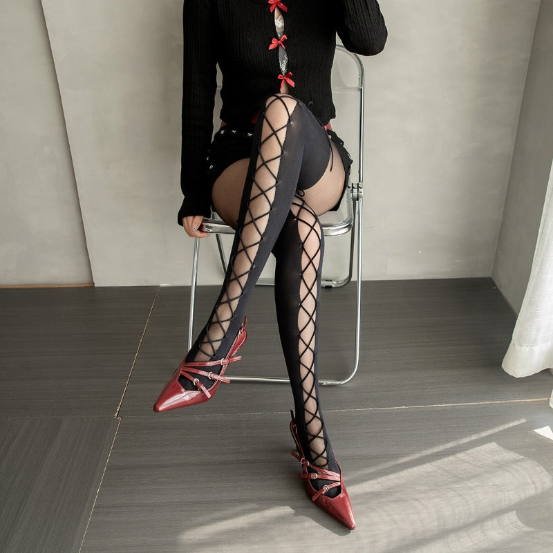 Black thigh-high stockings with crisscross lace pattern and red accent ties