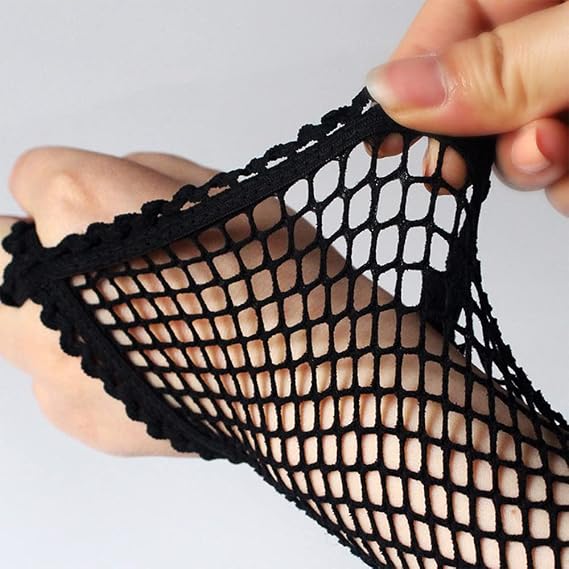 Black fishnet glove fabric close-up with scalloped trim and grid net pattern