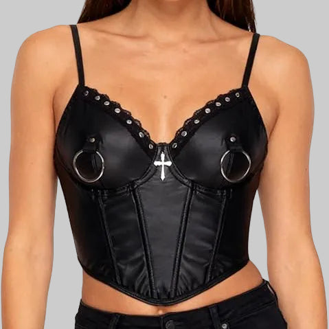 Model wearing black halter corset top with studded lace trim and silver cross charm