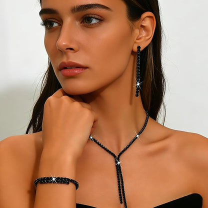 Auvexelle black beaded necklace with star pendant; dangling star earrings