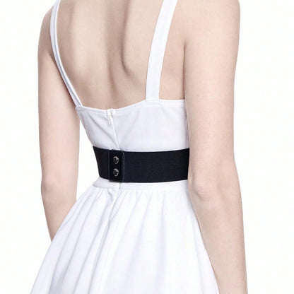 White strappy dress with black gothic waist cinch and snap-button band