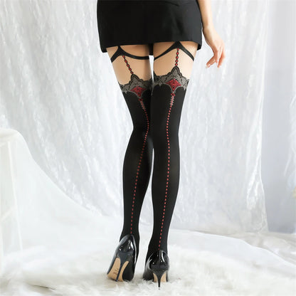 Black sheer thigh-high stockings with lace tops and red vertical stitching, with skirt