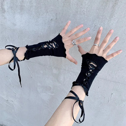 Black lace-up fingerless gloves with ribbon ties and open-hand design