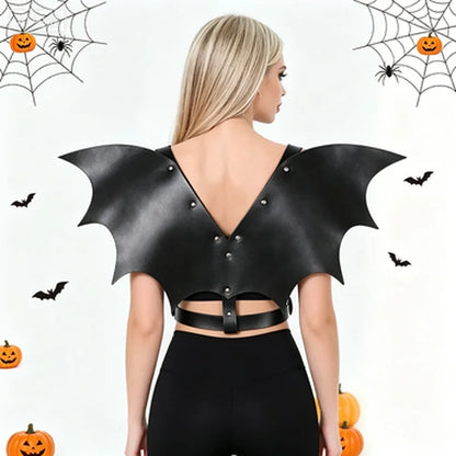 Black batwing cinch dress with V-back and studded wing sleeves, adjustable belt