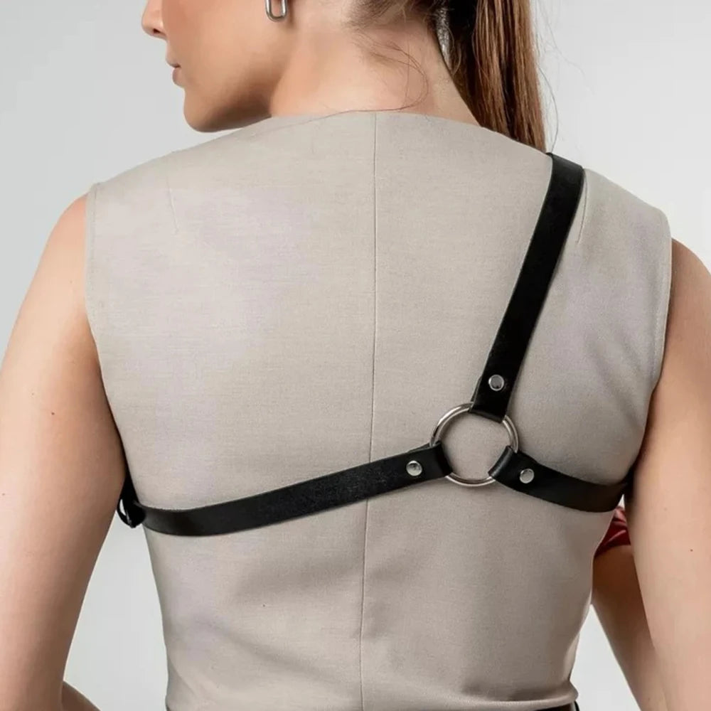 Back body cage harness with black straps and O-ring at shoulder