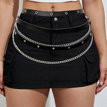 Black punk belt with metal eyelets and multiple silver chain rows on waistband