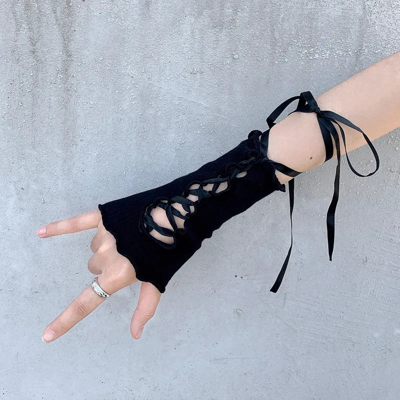Black fingerless lace-up gloves with ribbon straps and open fingers