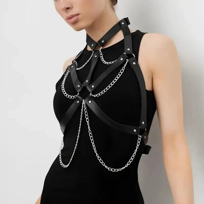 Black leather-look harness belt with silver chains across bust and shoulders, buckle straps