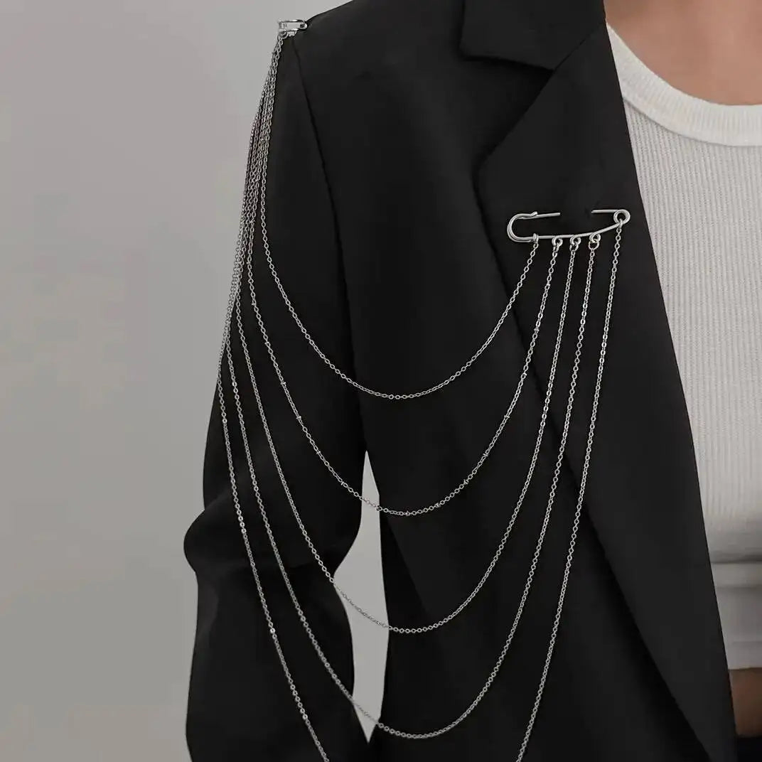 Layered silver chain drape necklace with clasp at neckline and multiple hanging chains