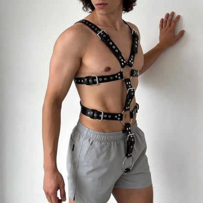 Black chest and shoulder harness with cross front straps, ring hardware and belt