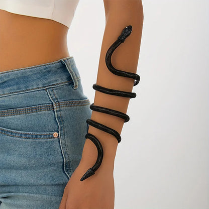 Black snake-style cord bracelet with multiple looped wraps on wrist