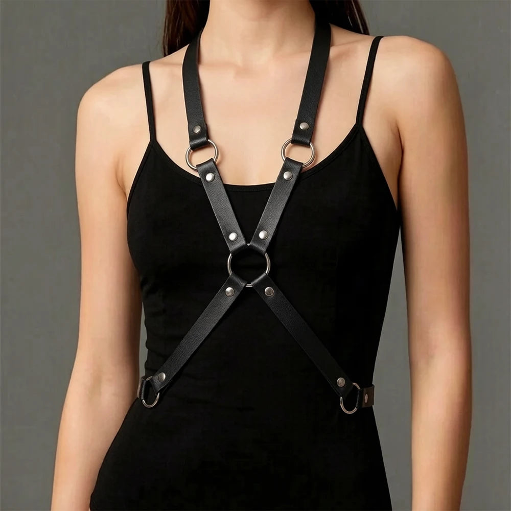 Black strappy corset harness with V-neck straps and metal rings, adjustable shoulder bands