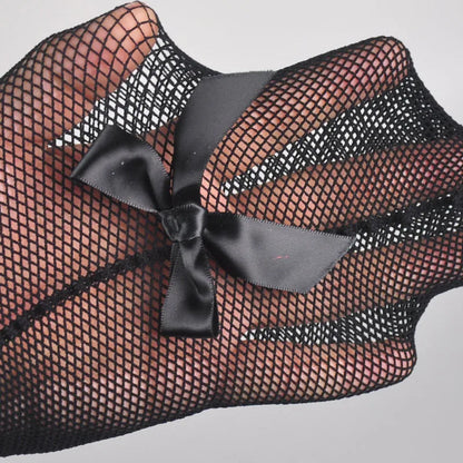 Black fishnet stockings with wide satin bow at the top