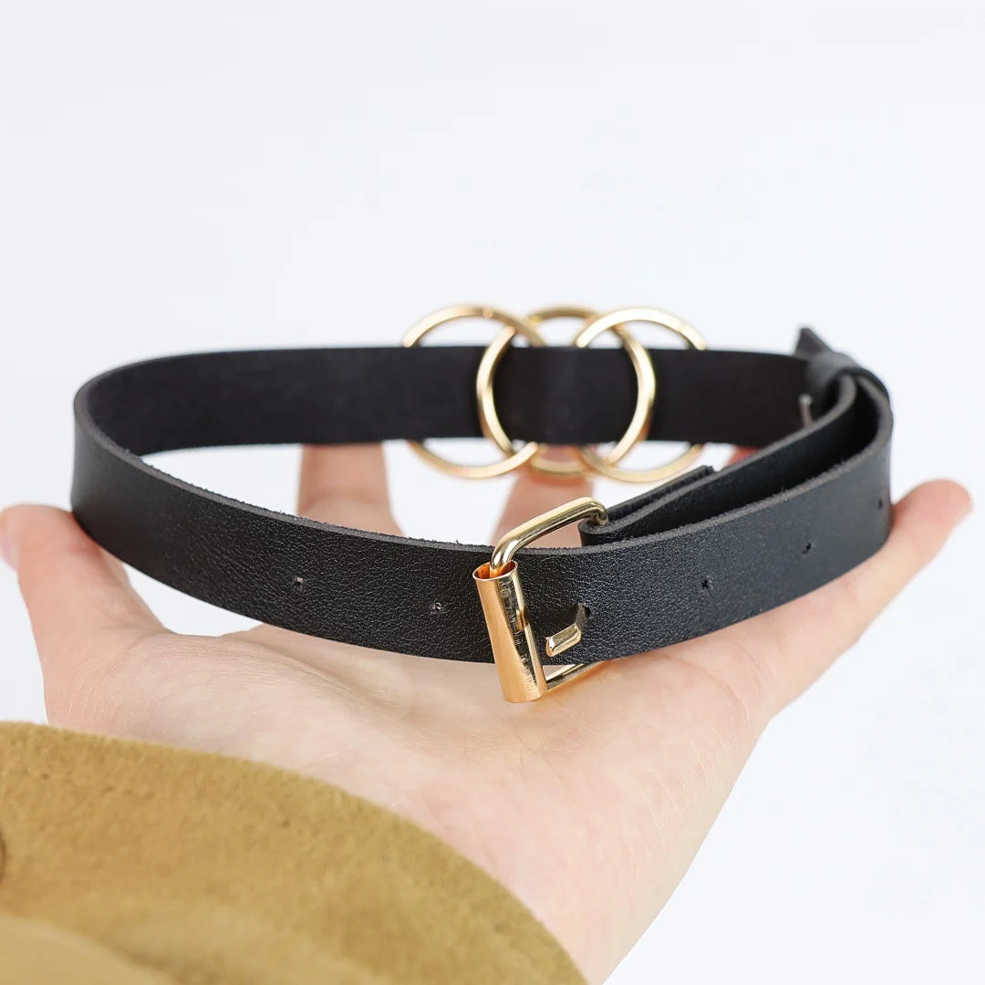 Black leather choker with buckle and gold-tone three-ring centerpiece