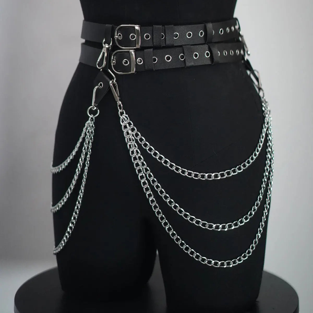 Black layered chain waist belt with double strap and long silver chain drapes