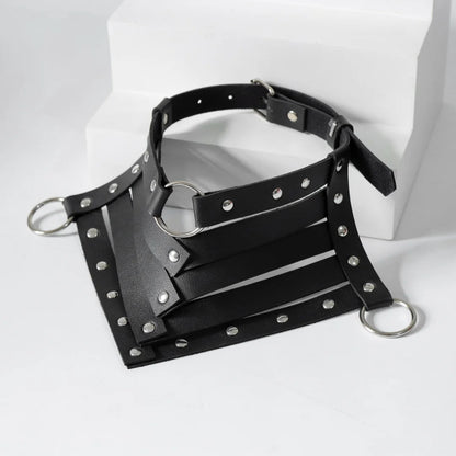 Black leather neck harness with silver studs, crisscross straps and metal O-rings