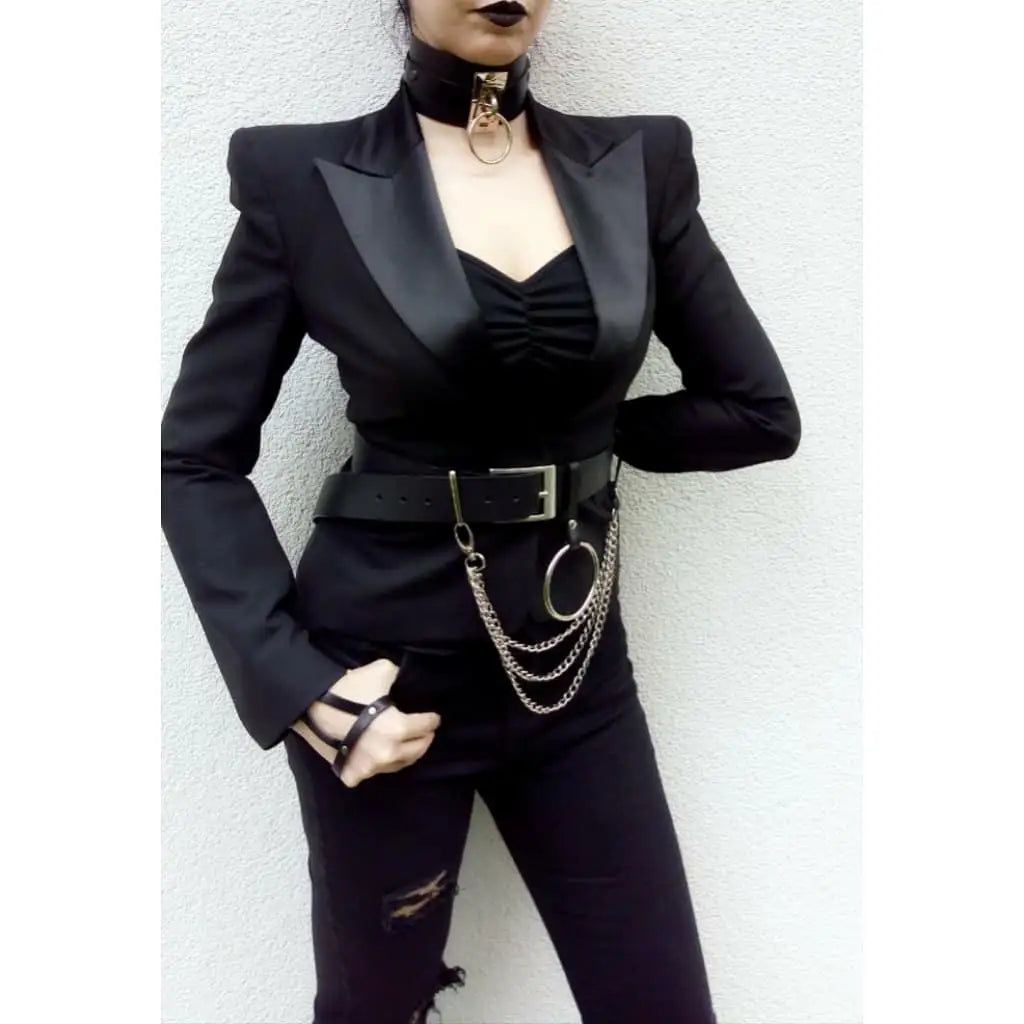 Black waist belt with silver buckle, chain drape and hanging circular ring