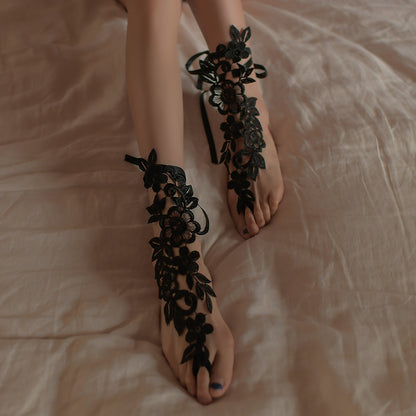 Black lace ankle garters with floral applique and ribbon bows