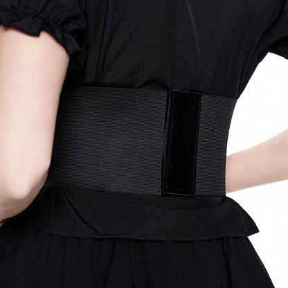 Black fabric belt with snap center and chain veil, gothic hardware charms, close-up