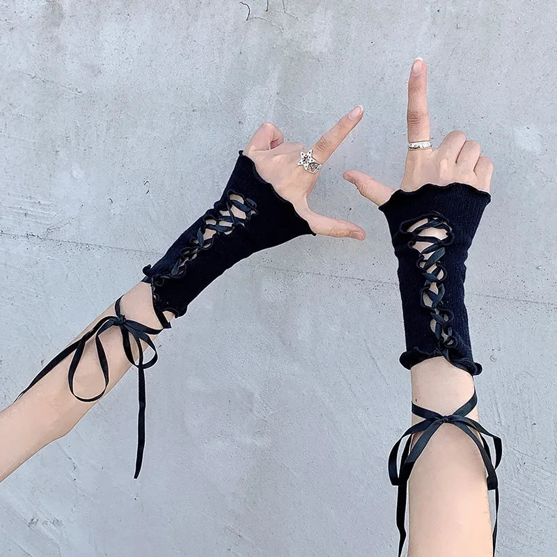 Black ribbed lace-up fingerless gloves with crisscross front and hanging ribbons