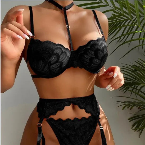 Black lace balconette bra with garter belt and high-cut garter panties
