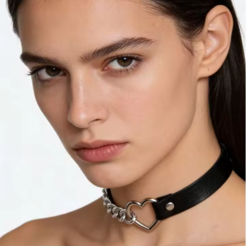 Heart charm choker around neck with black strap and silver-tone chain links