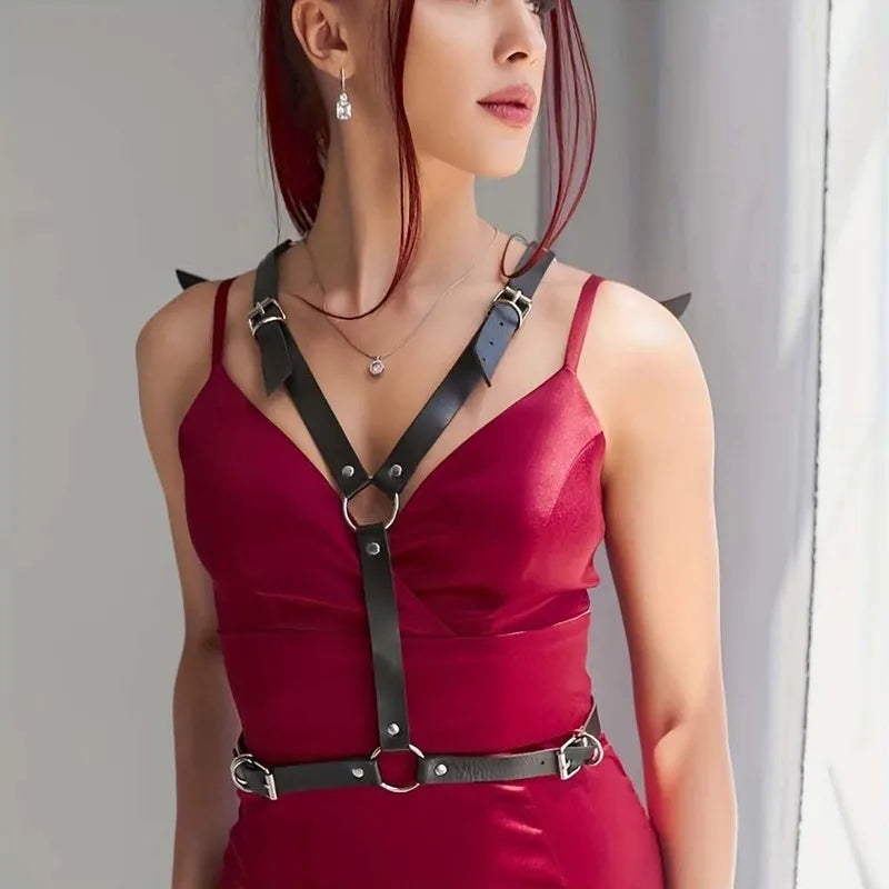 Zelvique Darkflight harness with black shoulder wings, chest V straps, silver buckles, burgundy dress