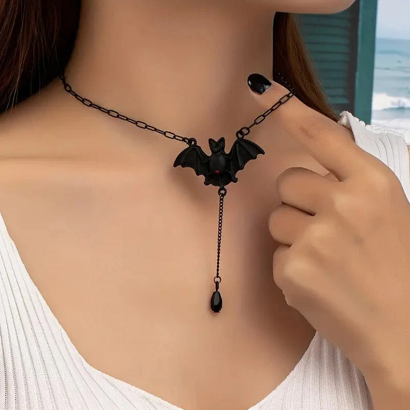 Bat charm pendant necklace with long chain, black enamel style and teardrop dangle