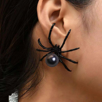 Black spider ear cuff with round pearl drop and spindly legs