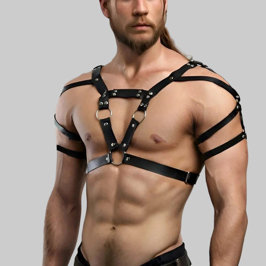 Black leather chainbound chest harness with crisscross straps and metal rings