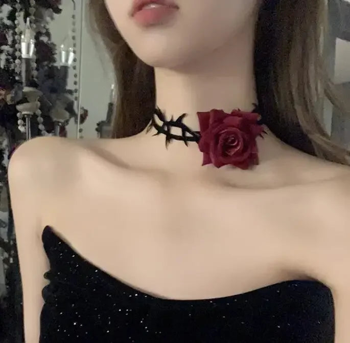 Black thorn choker necklace with small red rose centerpiece and hook clasp
