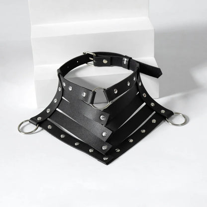 Black leather neck harness with silver studs, metal rings, and adjustable buckle