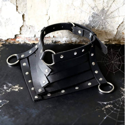 Studded black leather neck collar with metal rings and buckle straps