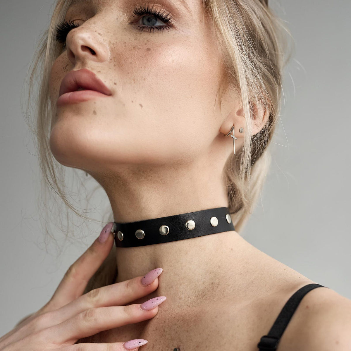 Black wide leather choker with metal eyelets and stud detail